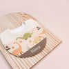 Handmade Bib - Dino Trail (Cream)