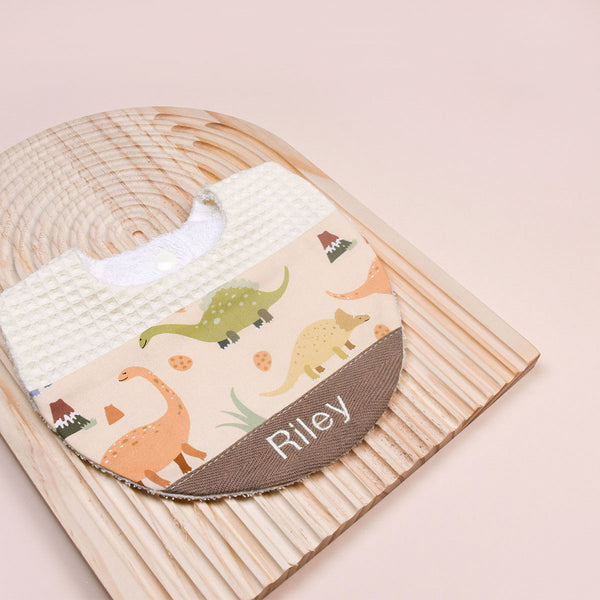 Handmade Bib - Dino Trail (Cream)